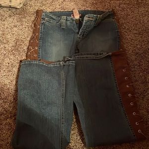 Boot cut jeans with leather crisscross all the way up